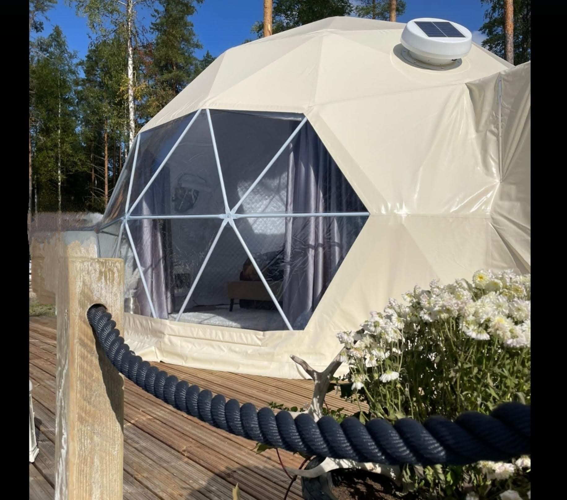 Group glamping and lakefront gathering area at Watson's Lakefront Resort