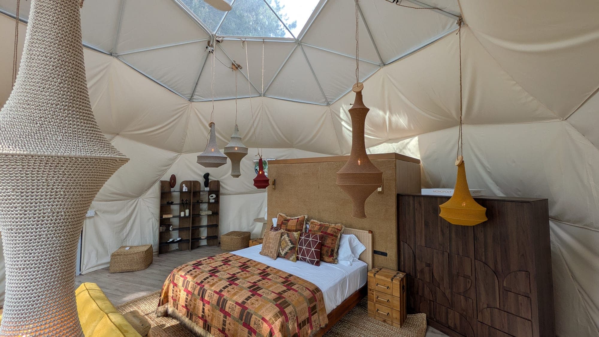 Geodesic Dome bedroom looking up through the peak skylight