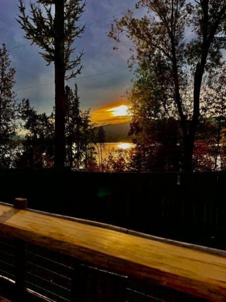 Sunset over Rose Lake from the lakefront railing at Watson's Lakefront Resort, Cataldo, Idaho